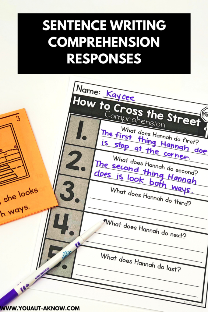 Text overlay: "Sentence writing reading comprehension responses" with an orange text on the left side. Worksheet on the right titled "How to cross the street" with a purple marker on a white background.